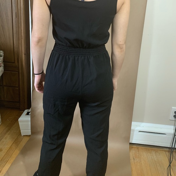 Zipper Front Long Sleeved Matte Romper in Black